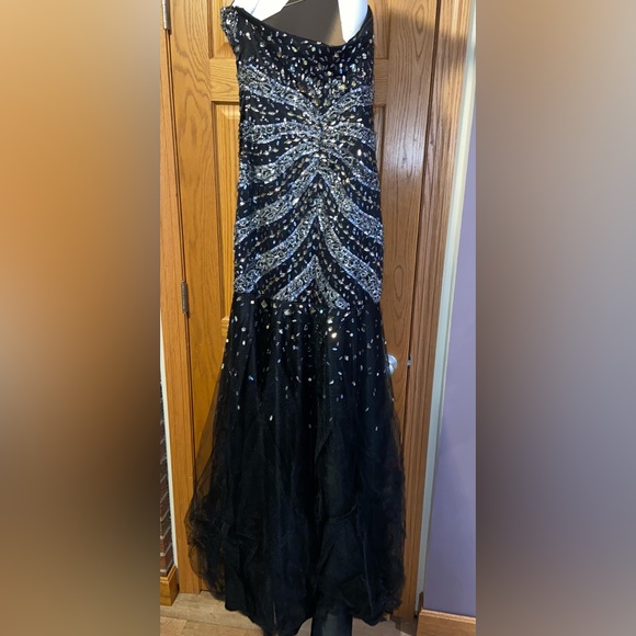 Dresses Black And Silver Bedazzled Prom Dress The Dress Has A Mermaid